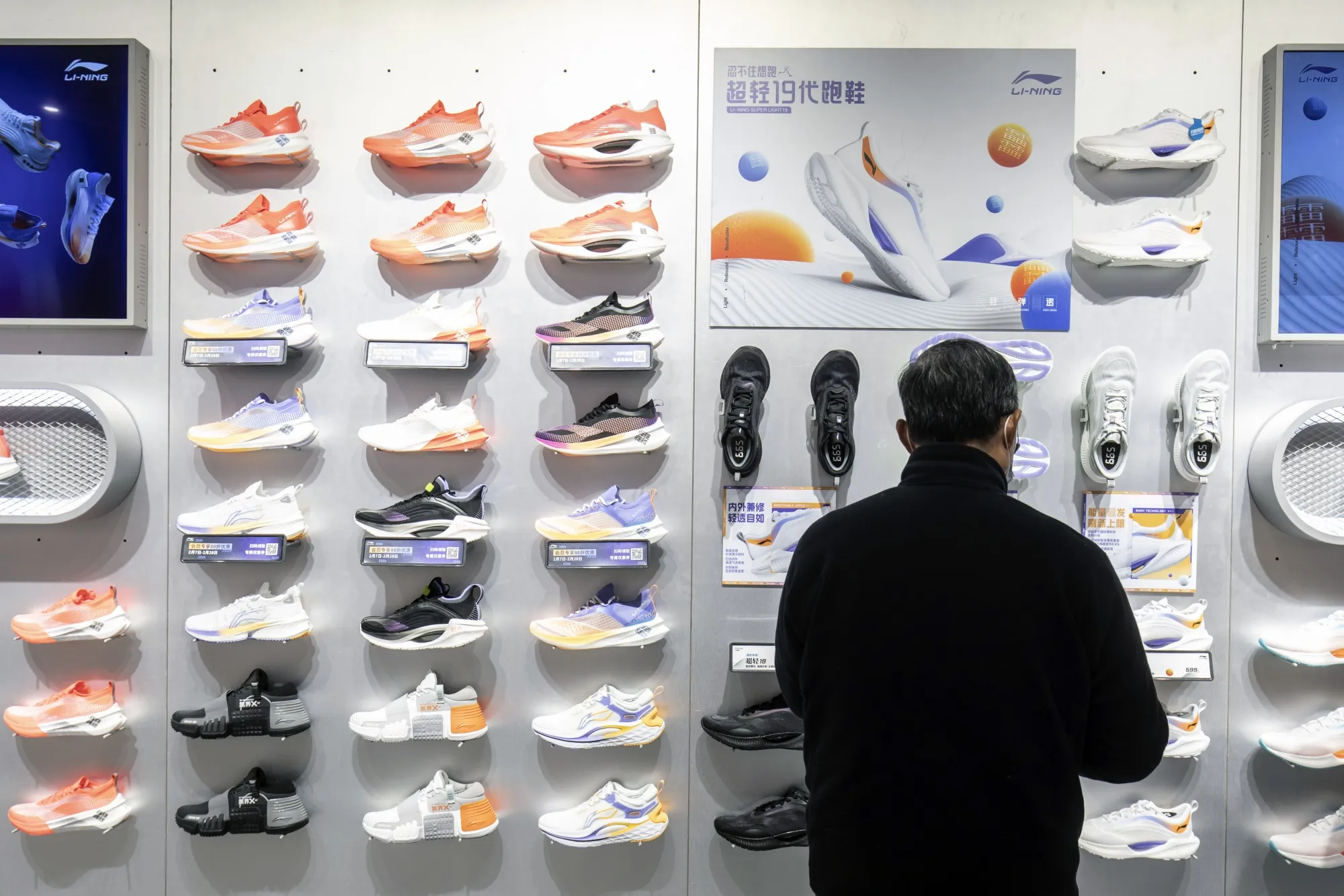 A customer browses shoes at a Li Ning Co. flagship store in Shanghai earlier in February.