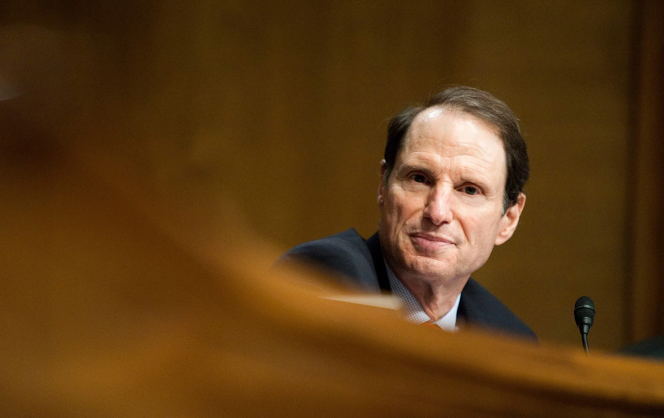 Senator Ron Wyden, a Democrat from Oregon, listens to testimony during a Senate Finance Committee hearing in Washington, D.C., U.S., on Wednesday, July 27, 2011.
