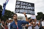 Carlos Esteban, a nursing student and recipient of DACA, protests the Trump administration's phasing out of the program.