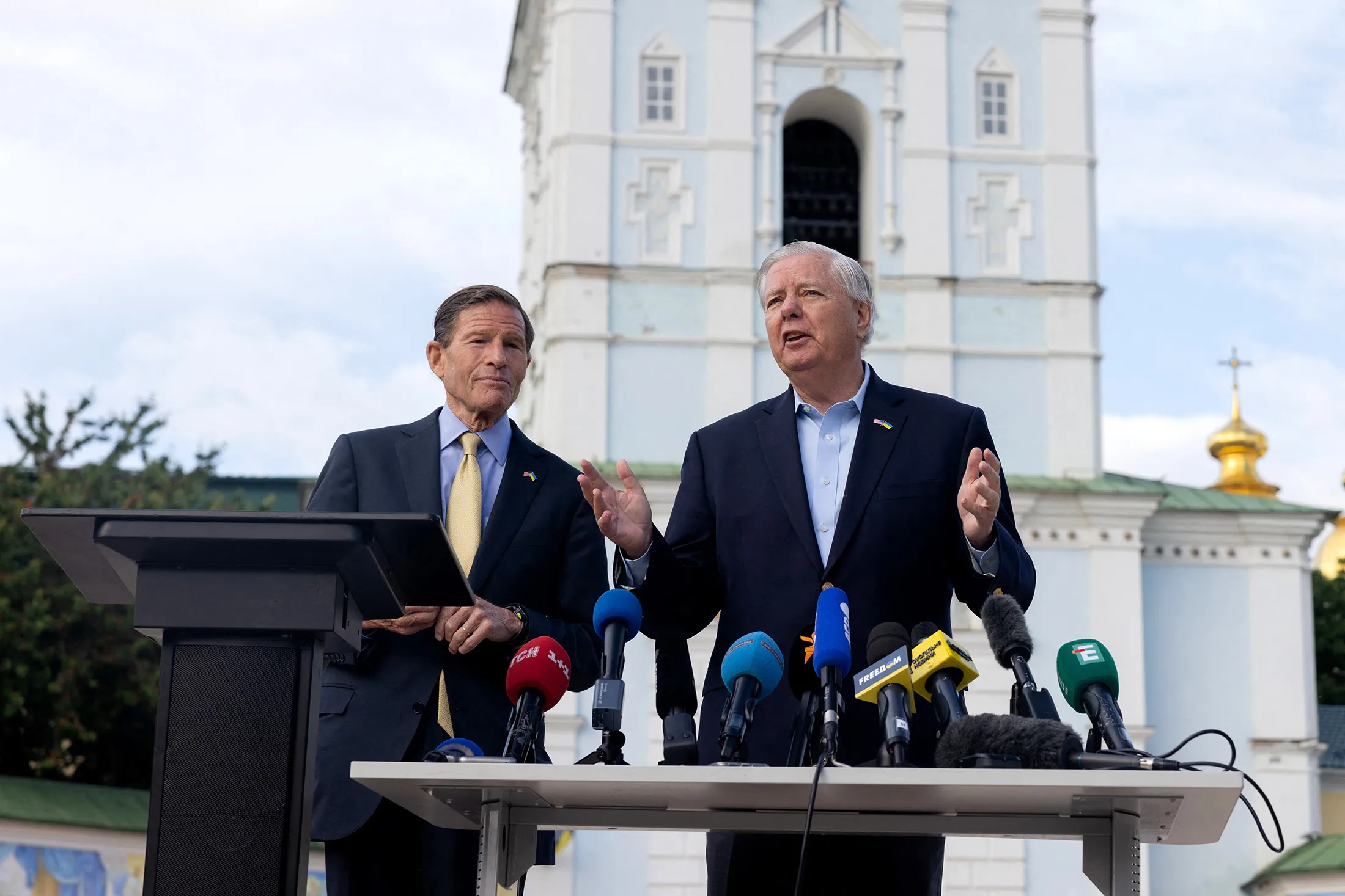 Senators Lindsey Graham, right, and Richard Blumenthal speak during a press conference at Mykhailivska Square in Kyiv on May 30.