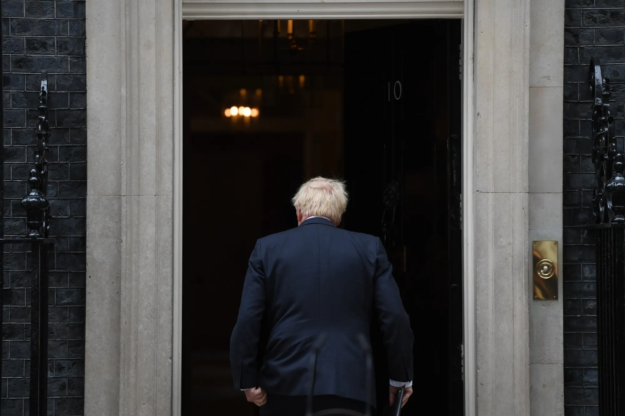 Boris Johnson returns inside 10 Downing Street after making his resignation speech on July 7.