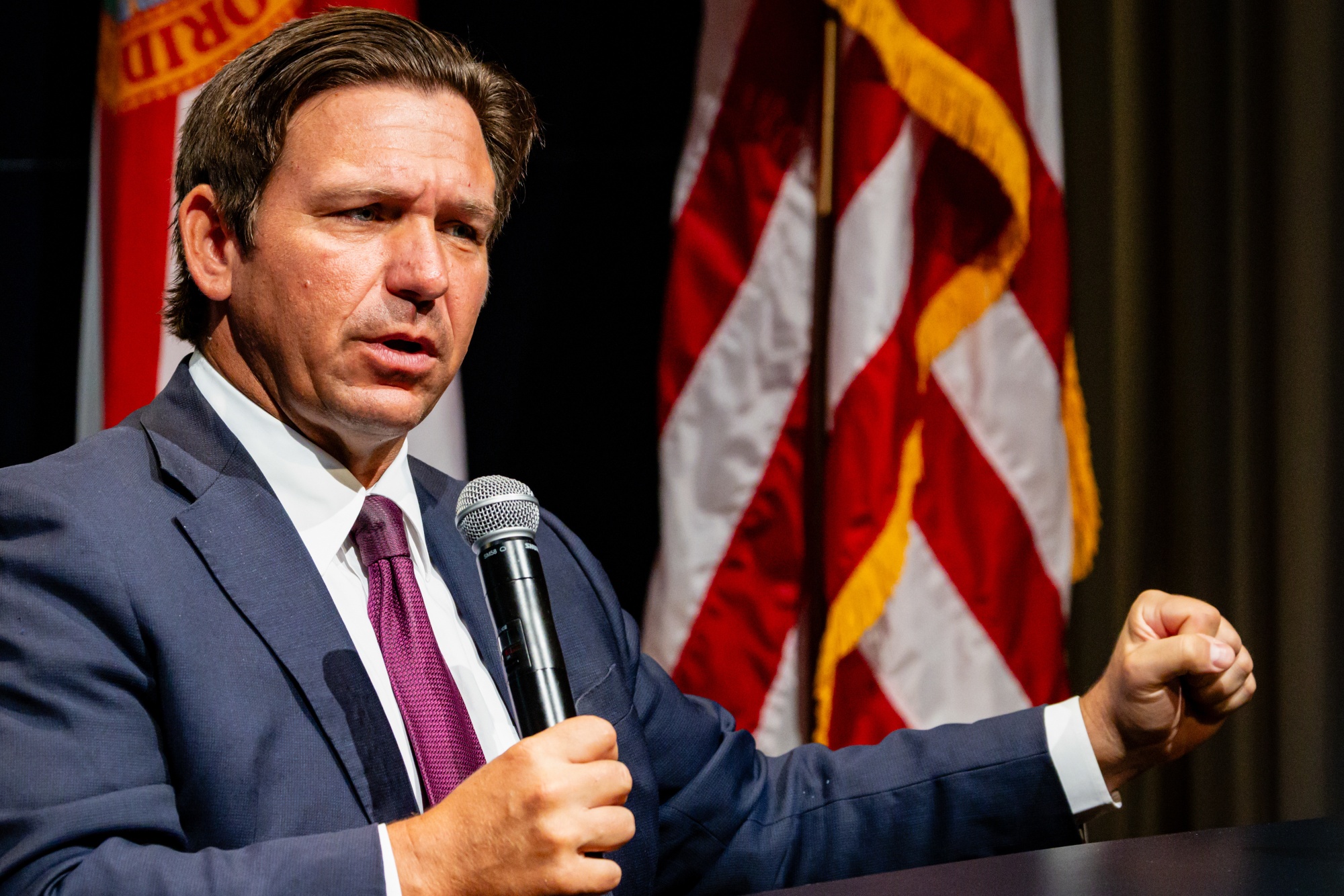 Ron DeSantis, governor of Florida, speaks during the Boom Belt event hosted by the Texas Stock Exchange in Miami, Florida, US, on Tuesday, April 7, 2026. The event brings together business leaders and policymakers to celebrate the region in the southeast quadrant of the US, from Florida to Texas, driving economic growth in America.
