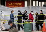 People wait in line at a vaccination site at Lincoln Park in Los Angeles, California, on Jan. 28.