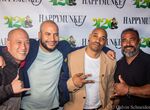 Vlad Bautista and Ramon Reyes, both in center, with guests at Happy Munkey’s April 20 “Farewell to Prohibition” party.