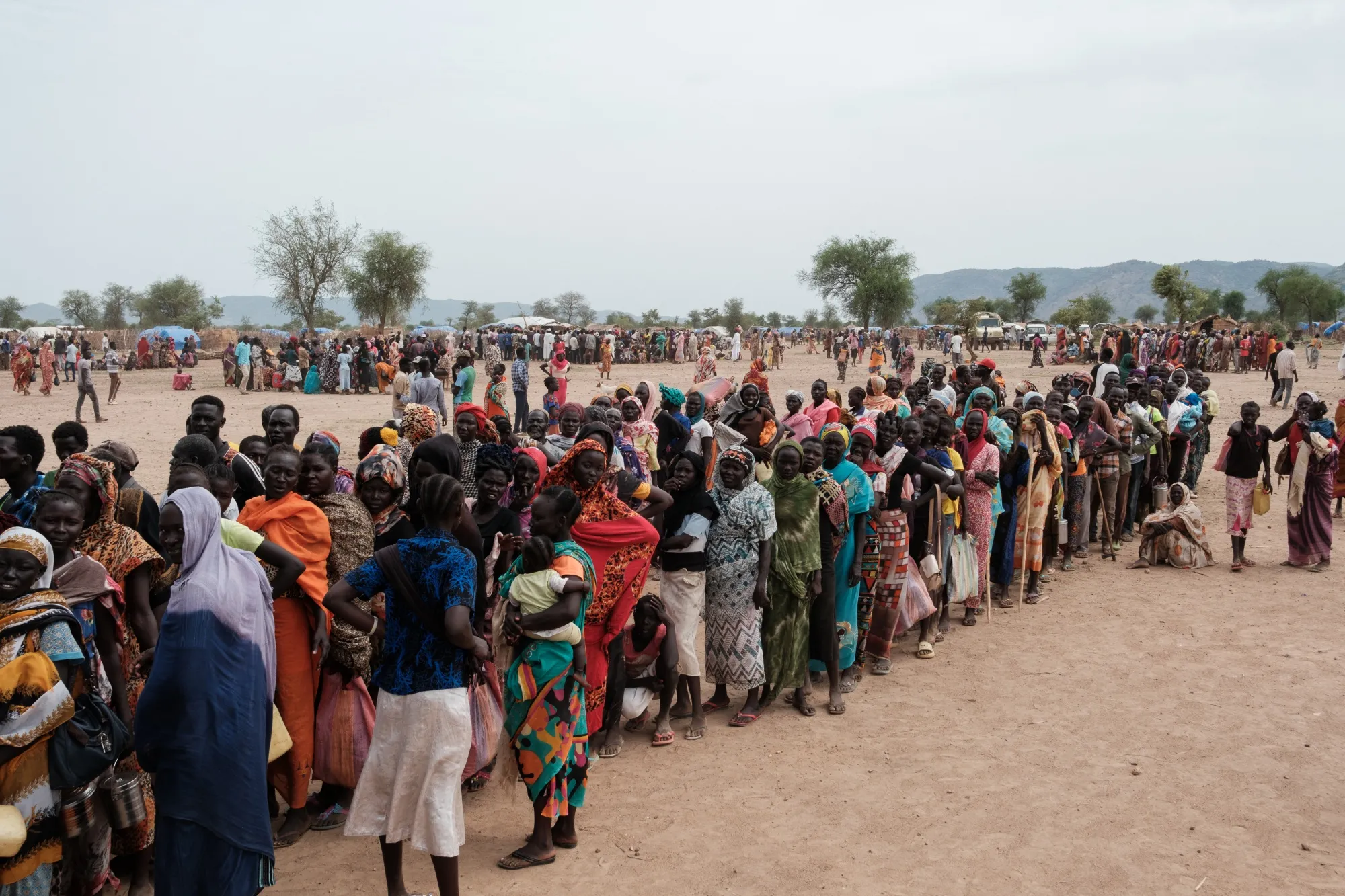 People line up to register for a potential food aid delivery at a camp for internally displaced persons&nbsp;in Agari, South Kordofan.