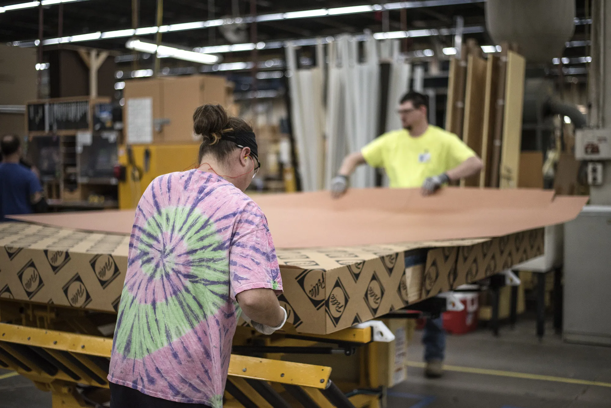 Workers package a window frames&nbsp;at a manufacturing facility in Pella, Iowa.