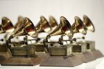 Grammy Awards are displayed at the Grammy Museum Experience at Prudential Center in Newark, N.J. on Oct. 10, 2017. The Recording Academy will announce the nominees for its 64th Grammy Awards on Tuesday morning. (AP Photo/Julio Cortez, File)