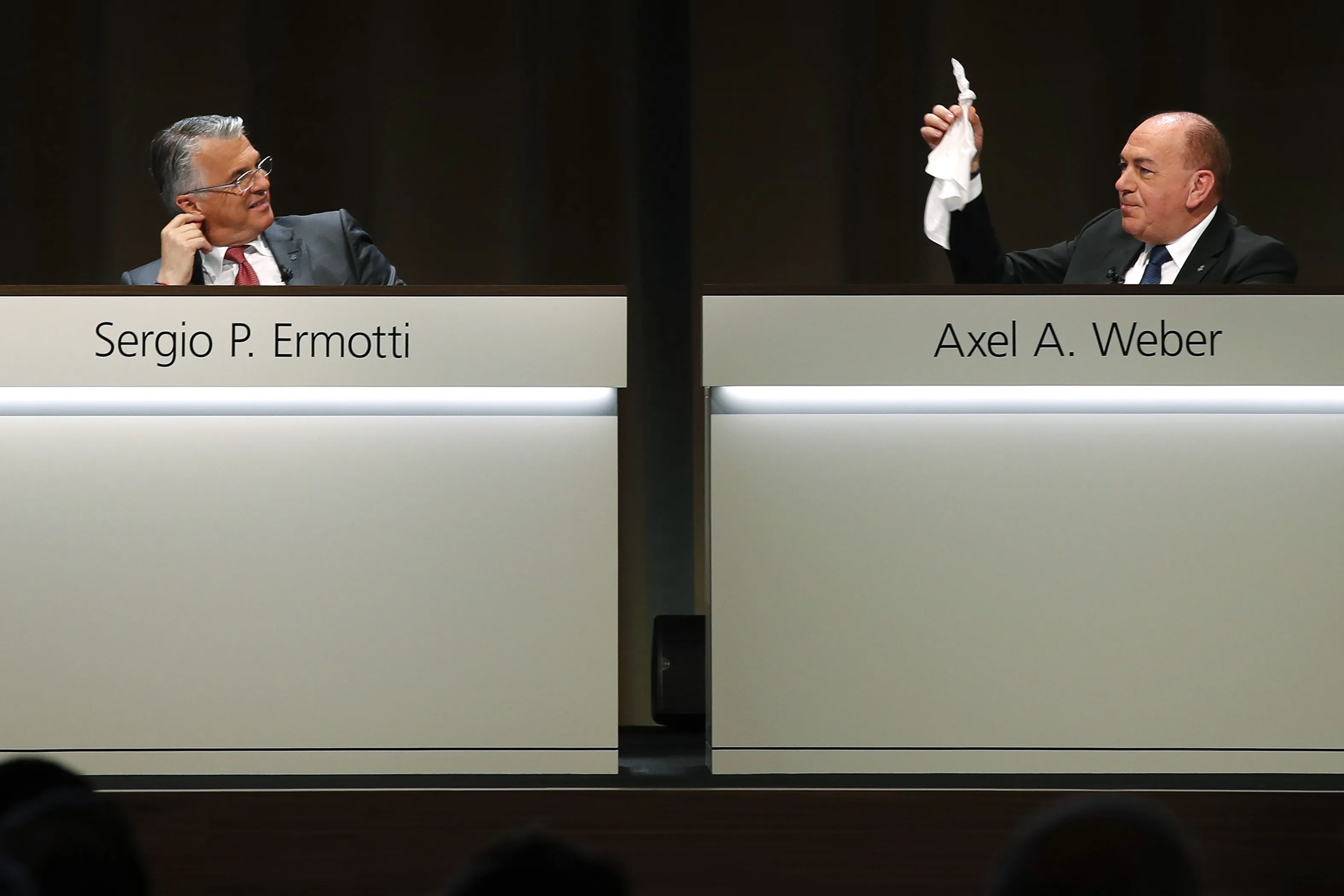 UBS Chairman Axel Weber is exploring the idea of a merger just Chief Executive Sergio Ermotti is departing.
