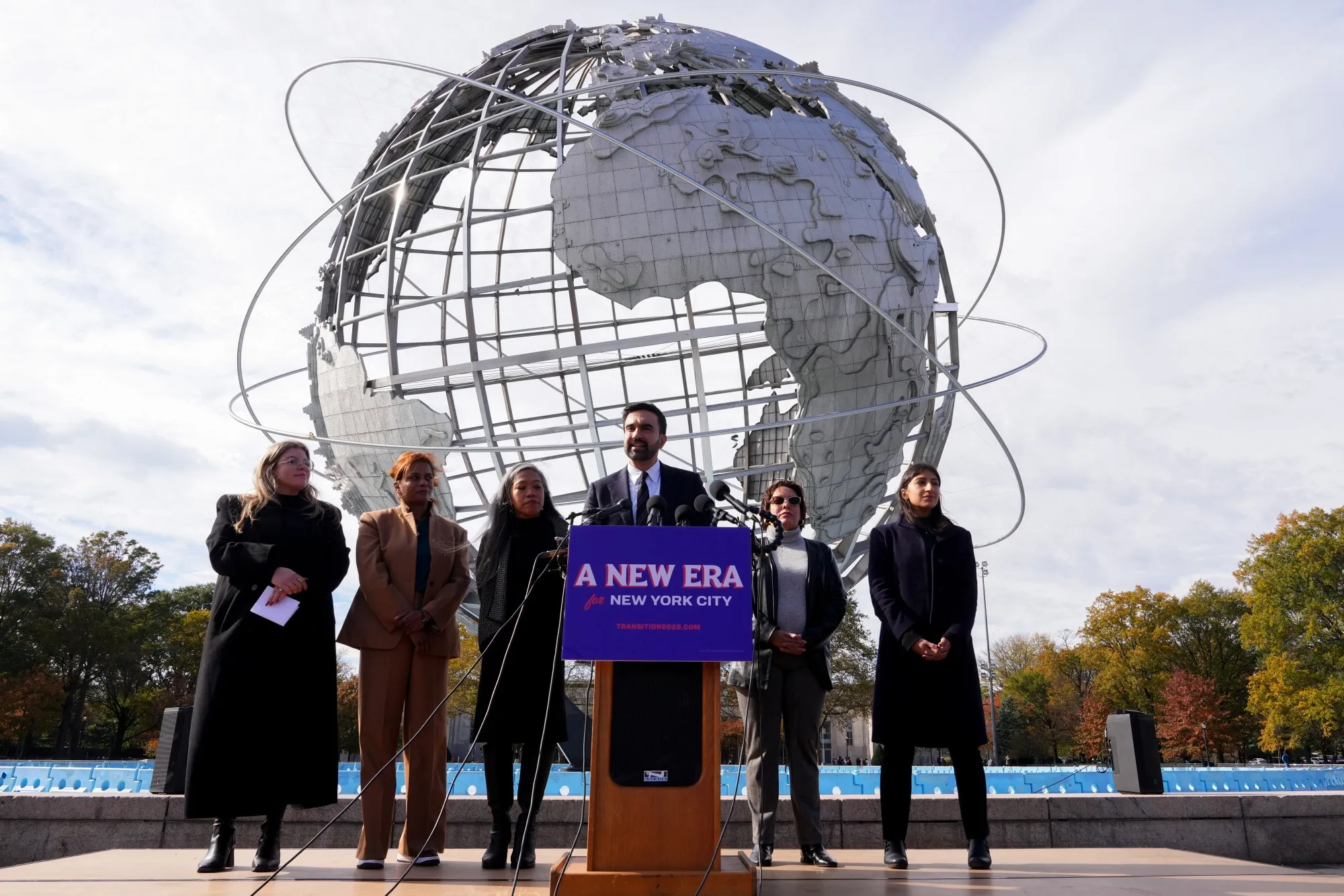 Zohran Mamdani, mayor-elect of New York, center, joined by members of his transition team,&nbsp;at Flushing Meadows Corona Park in&nbsp;New York on Nov. 5.