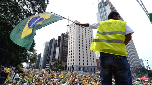 Demonstrators rally to protest against the government of president Dilma Rousseff in Paulista Avenue in Sao Paulo.