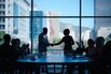 Business people, clapping and handshake for promotion in boardroom, merger and proud of deal. Partners, applause and thank you for teamwork or success, contract and silhouette in global acquisition