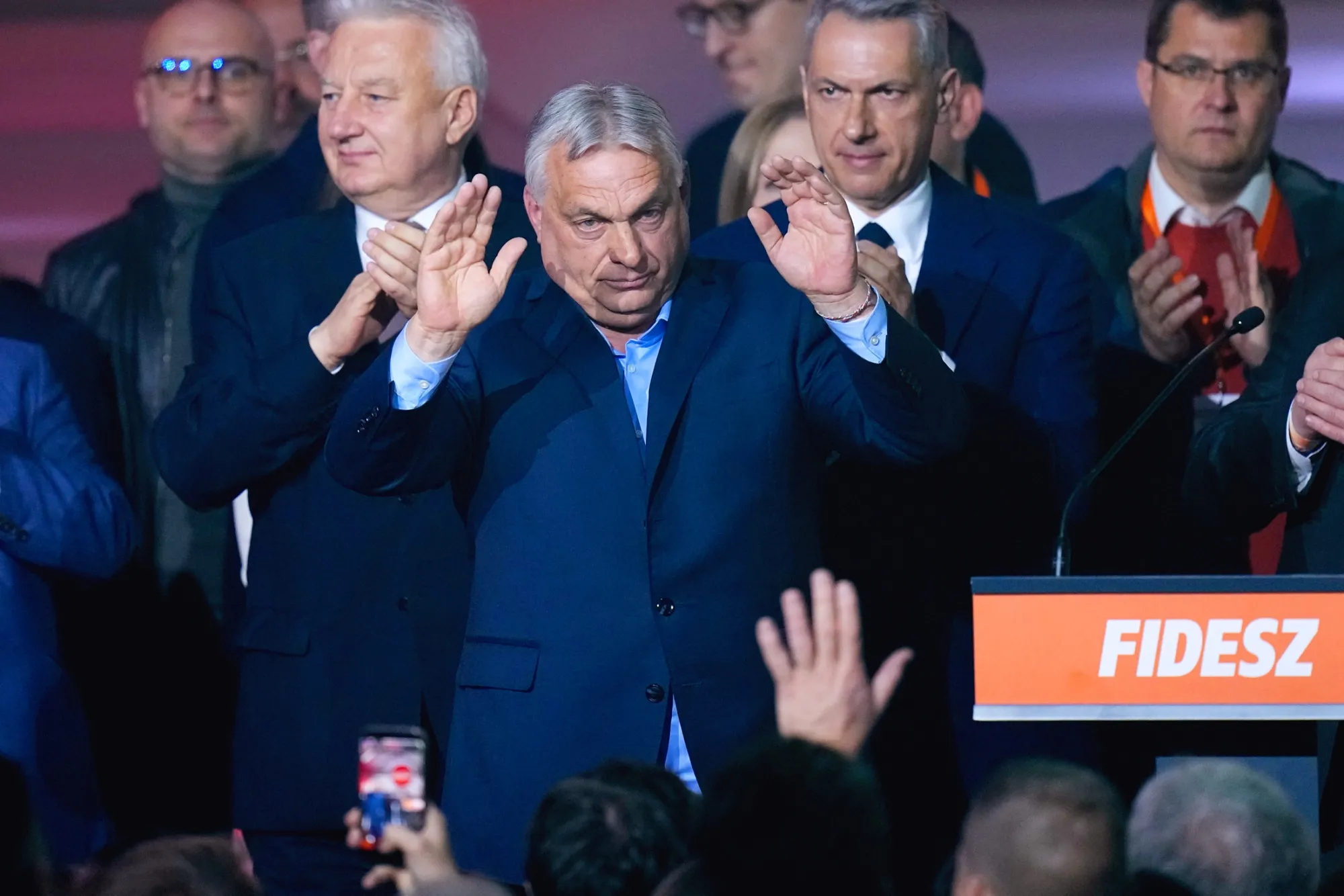 Viktor Orban waves to supporters during a Fidesz party election night event in Budapest, on April 12.