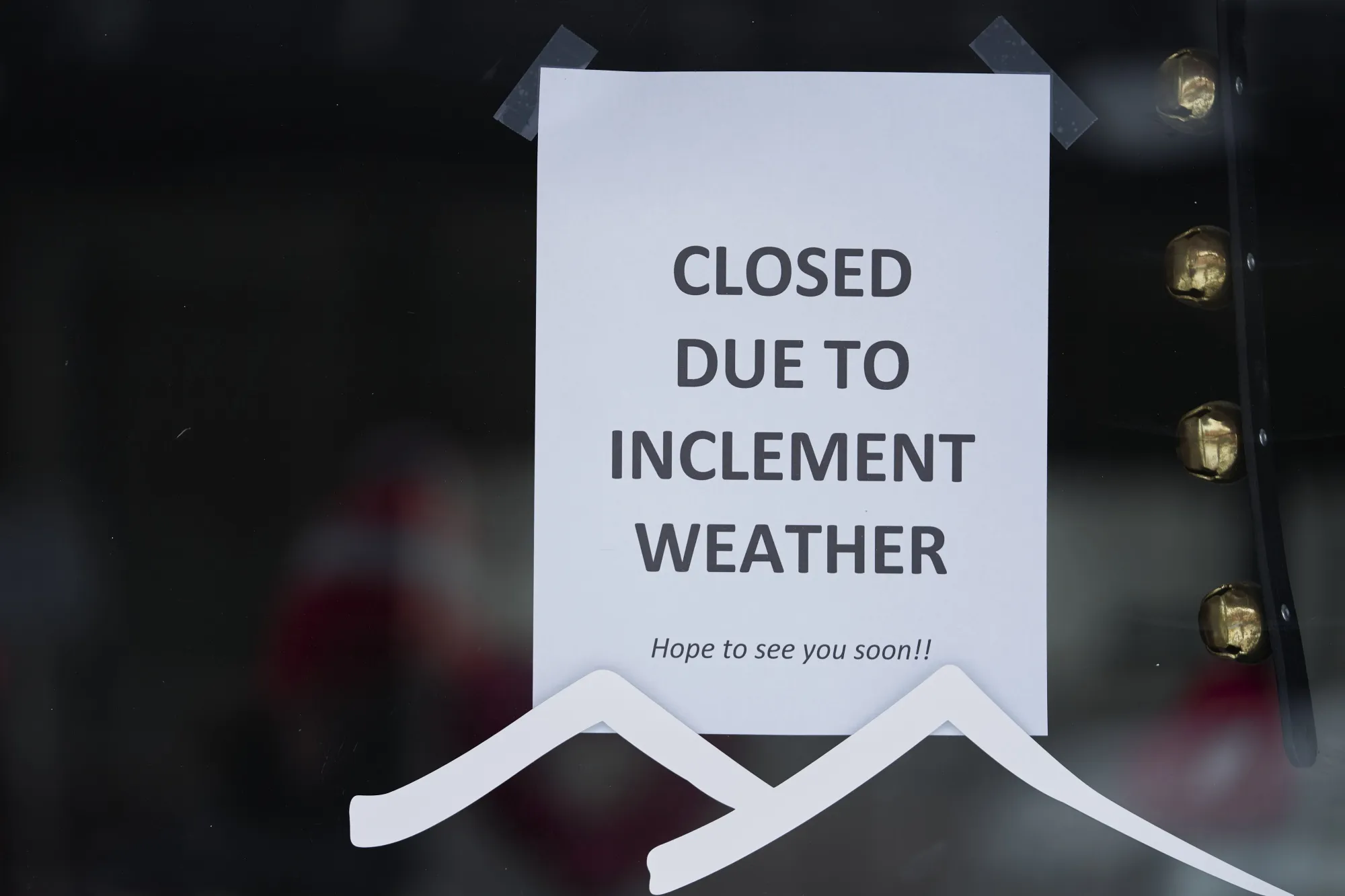 A sign on the door of a local business in McKinney, Texas, on Feb. 16.