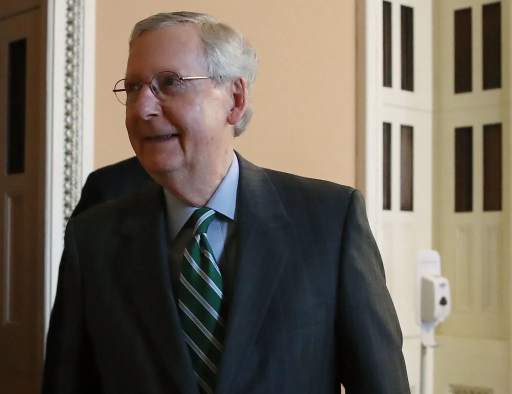 Why is this man smiling?
