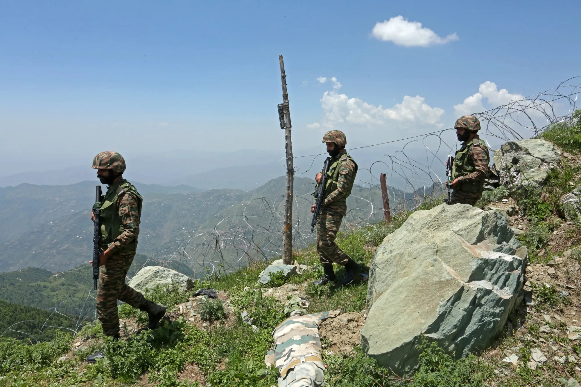 Indian soldiers patrol along the Line of Control in May.