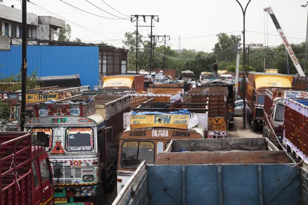 Trucks outside the Caravan Roadways office at Sanjay Gandhi Transport Nagar in Delhi.