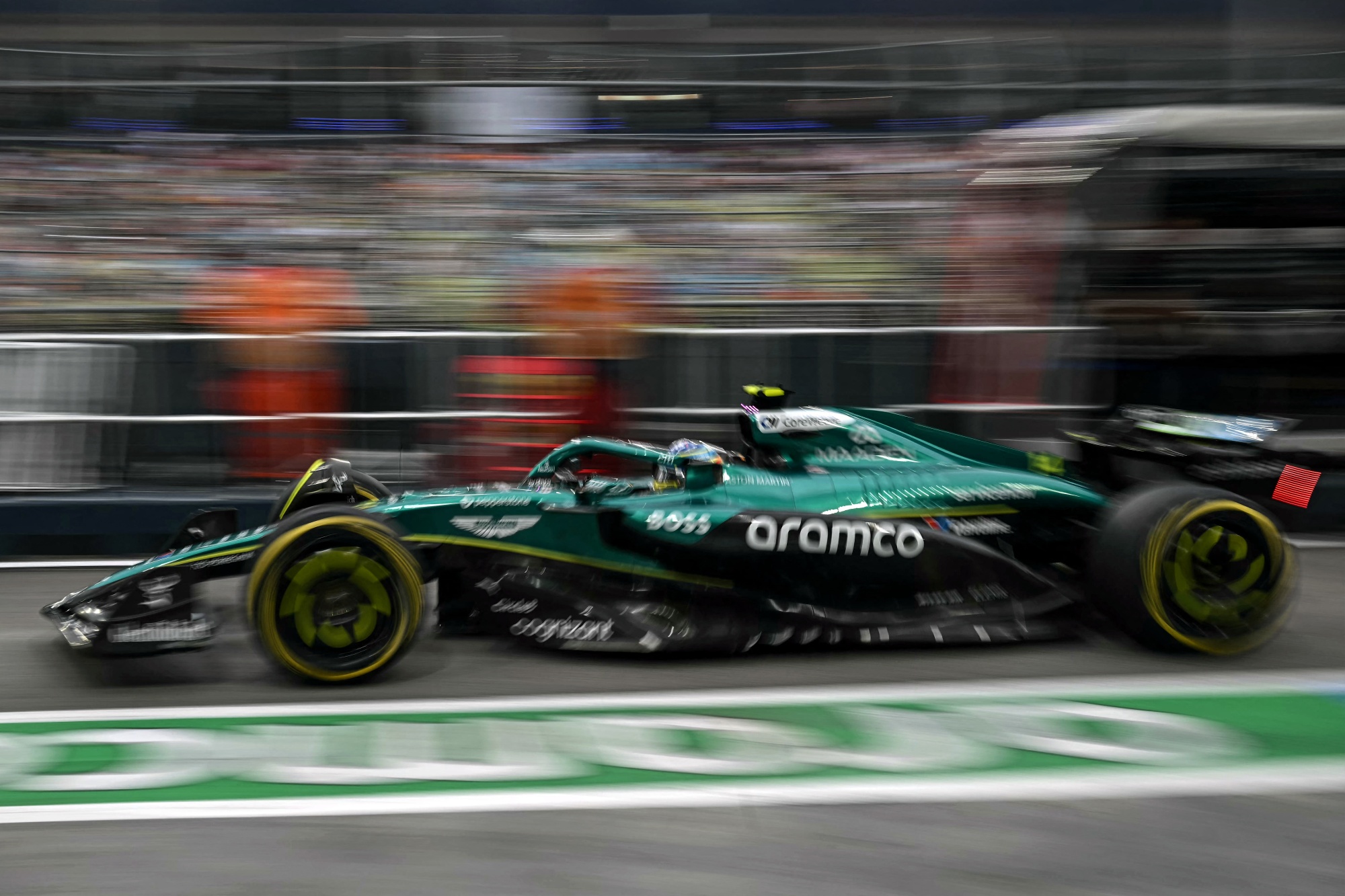 Aston Martin&#39;s Spanish driver Fernando Alonso during the first practice session ahead of the Formula One Singapore Grand Prix night race at the Marina Bay Street Circuit in Singapore on Oct. 3. Photographer: Lillian Suwanrumpha&#x2F;AFP&#x2F;Getty Images