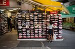 A shopper looks at Nike sneakers&nbsp;in Tokyo.&nbsp;