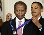REMOVES REFERENCE TO THE BAHAMAS - President Barack Obama presents the 2009 Presidential Medal of Freedom to Sidney Poitier during ceremonies in the East Room at the White House in Washington on, Aug. 12, 2009.  Poitier, the groundbreaking actor and enduring inspiration who transformed how Black people were portrayed on screen, became the first Black actor to win an Academy Award for best lead performance and the first to be a top box-office draw, died Thursday, Jan. 6, 2022. He was 94. (AP Photo/J. Scott Applewhite, File)