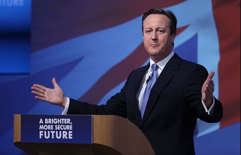 David Cameron, U.K. prime minister and leader of the Conservative Party, gestures as he unveils the party's 2015 general election manifesto in Swindon, U.K., on April 14, 2015.