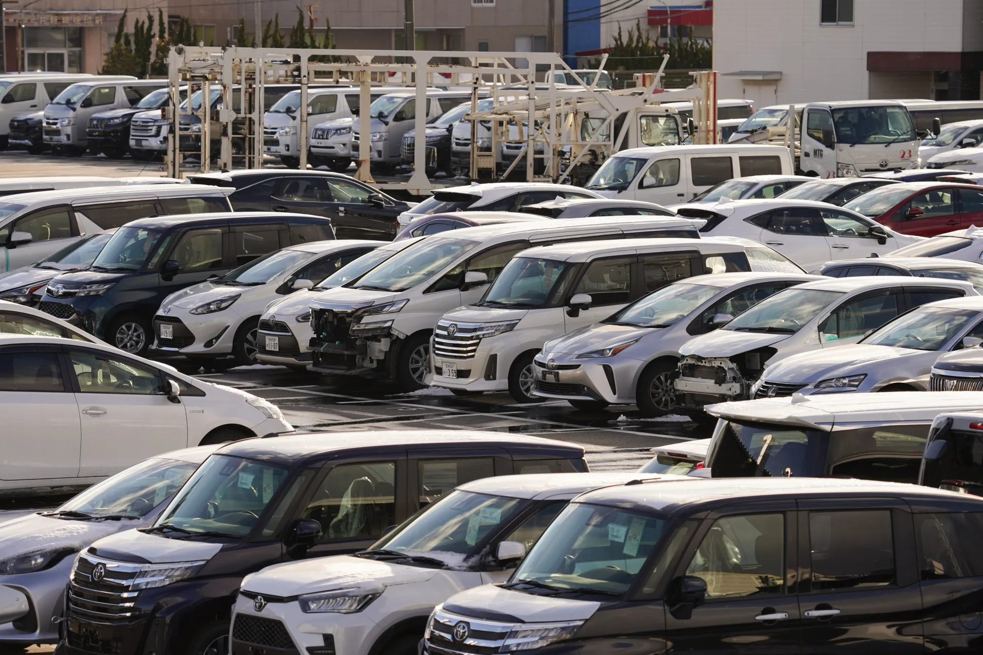 Toyota vehicles parked at the company's dealership in Sendai,&nbsp;Japan.