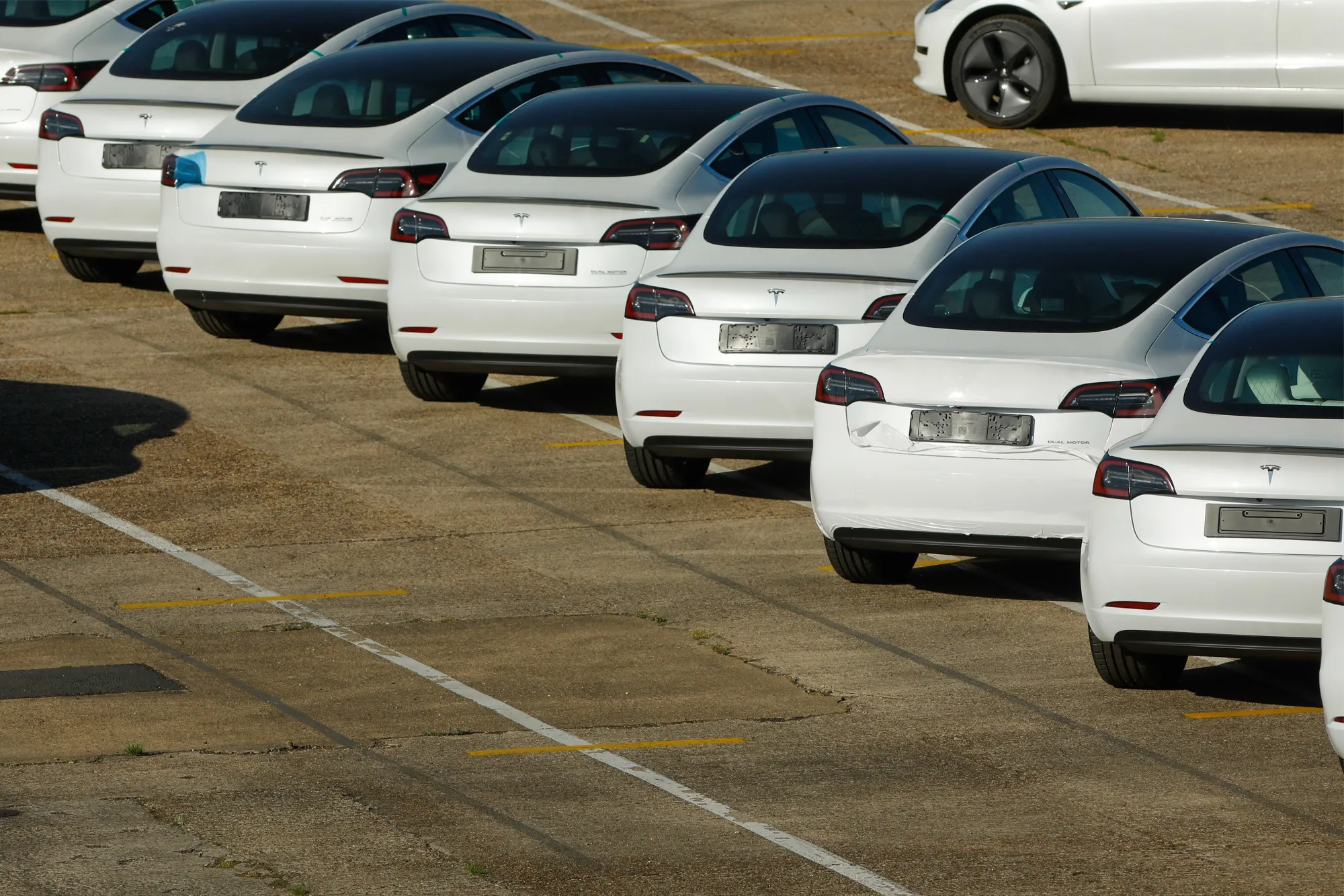 Telsa Inc. Automobiles Dockside At U.K. Port