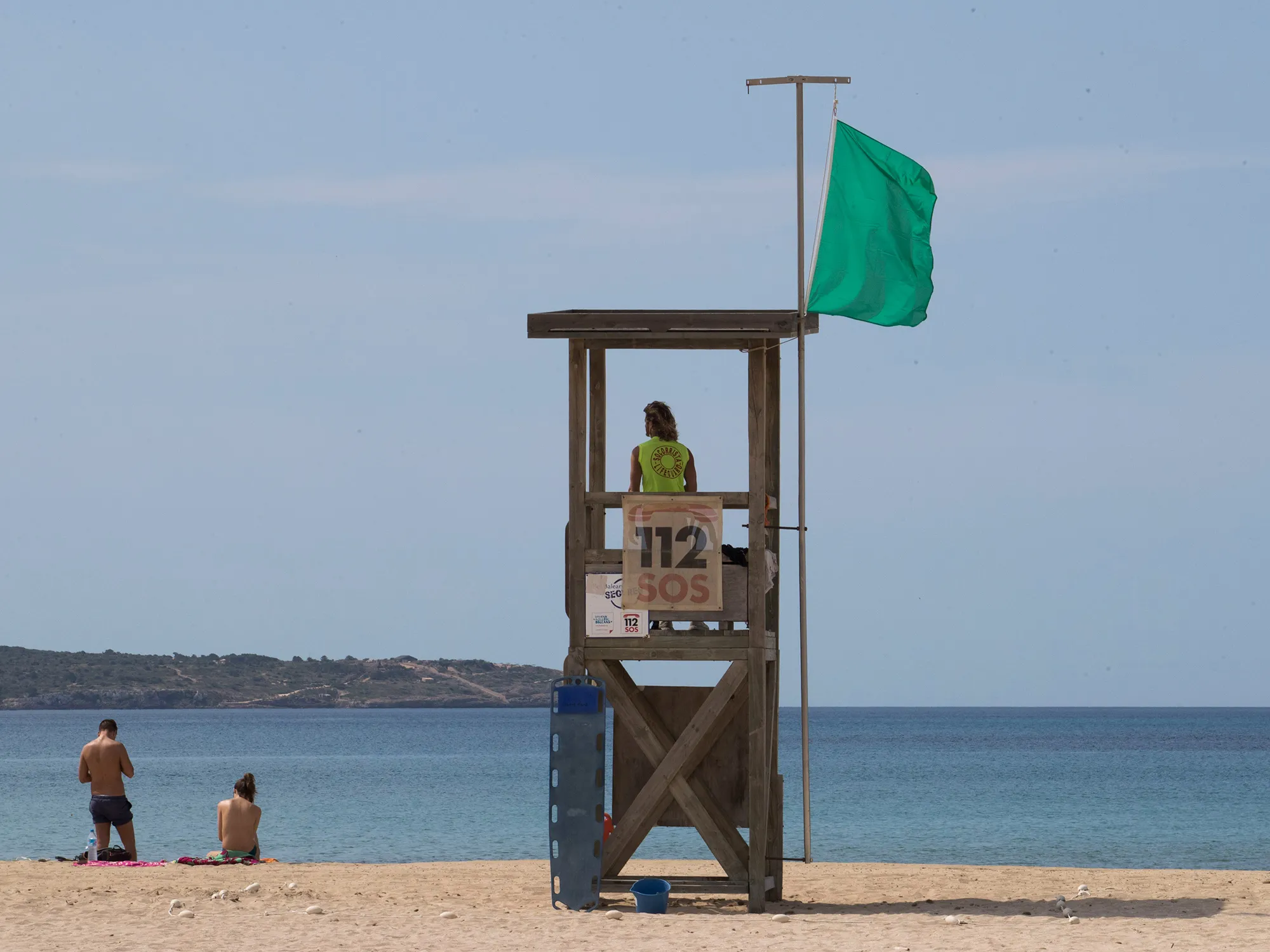A beach watcher on th Can Pastilla Beach in Palma de Mallorca, Spain,&nbsp;on May 25.