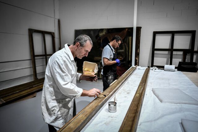 Images from 2022 show paintings from the cathedral being worked on at the restoration workshop on the outskirts of Paris