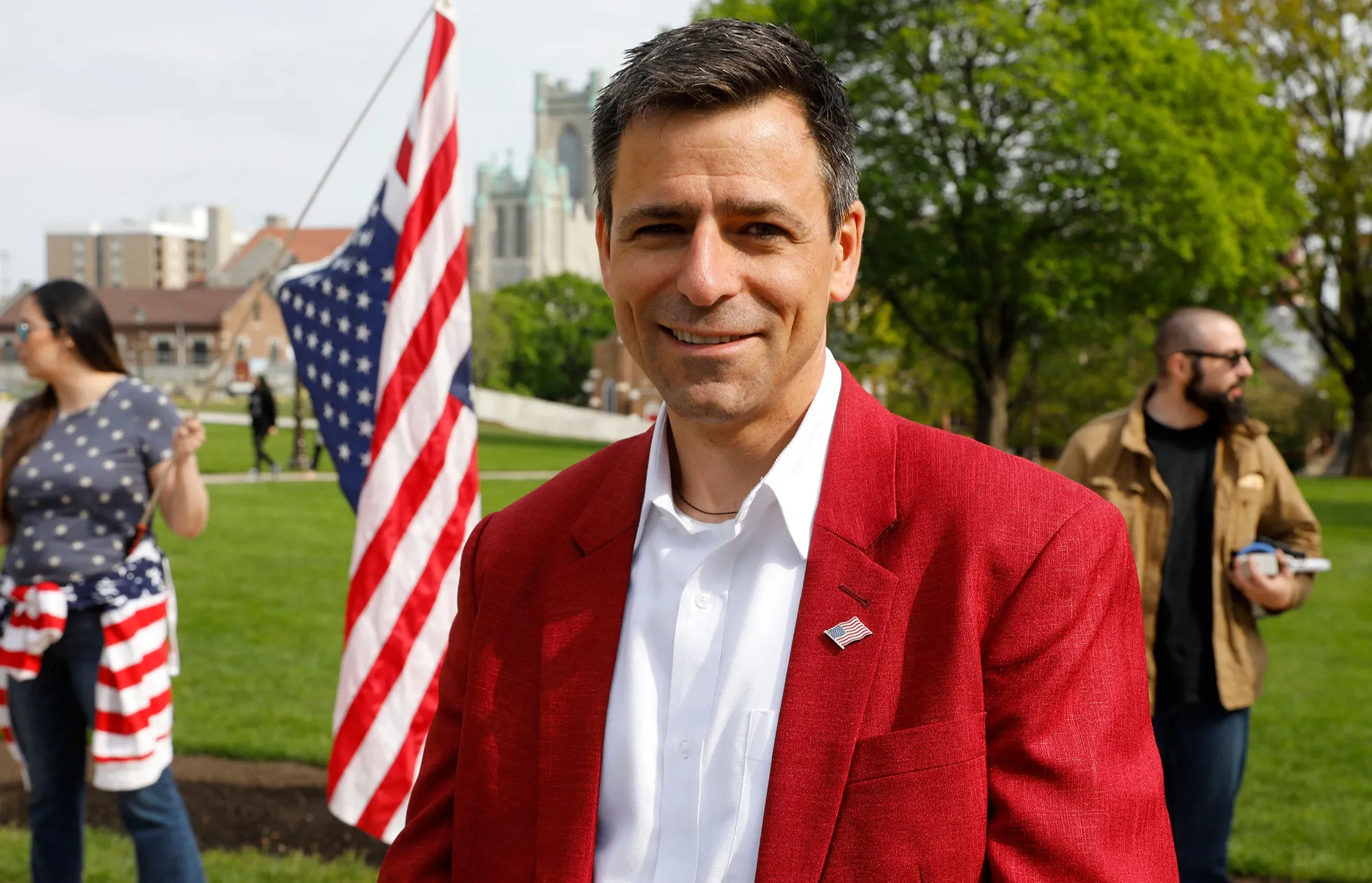 Ryan Kelley during a demonstration outside the Michigan State Capitol in Lansing, Michigan on May 15, 2021.