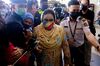 Rosmah Mansor, center, arrives at the Kuala Lumpur Courts Complex, on Feb. 18.