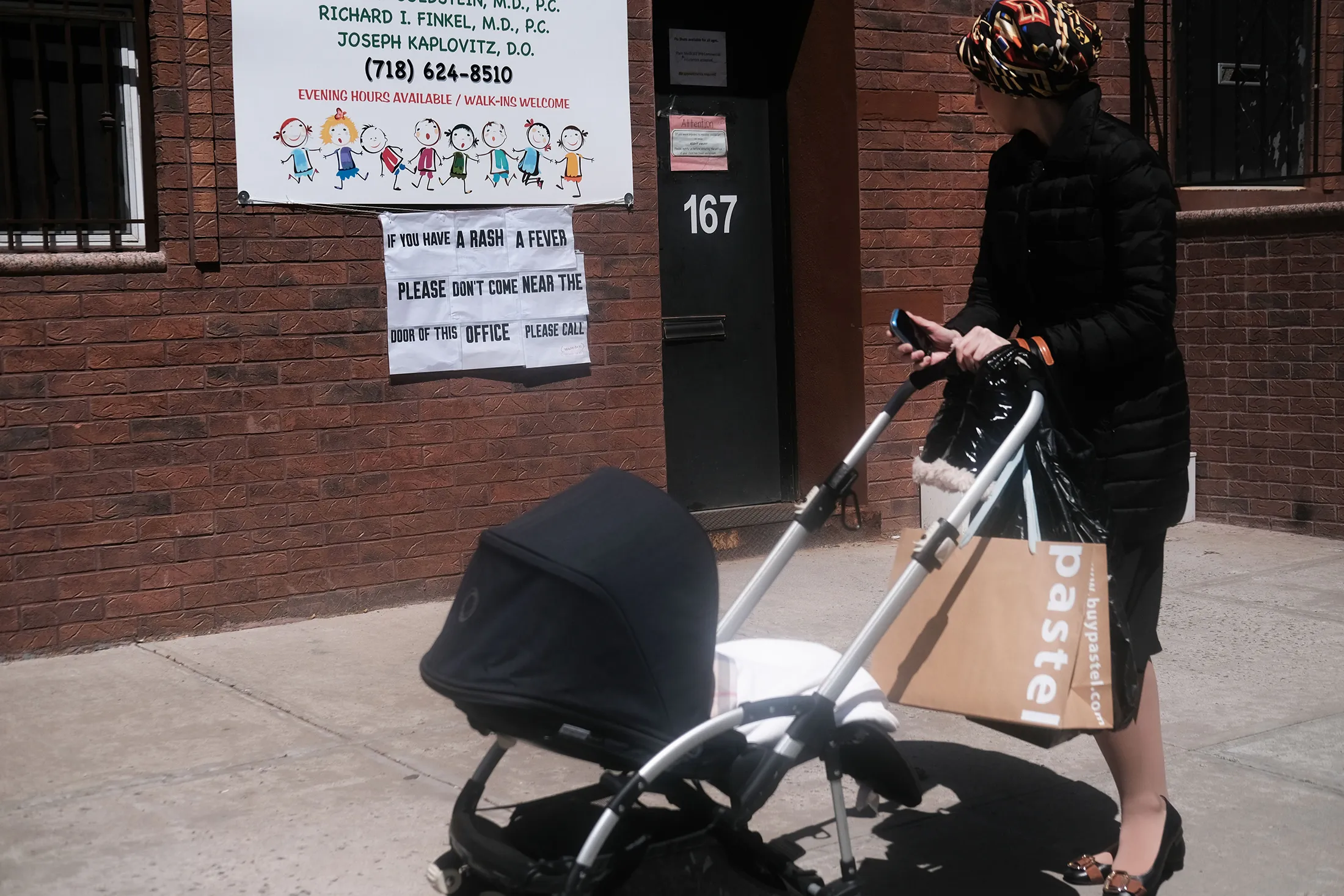 A sign warns people of measles in in Williamsburg on April 10.