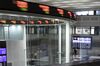 A visitor takes a photograph of screens displaying stock figures at the Tokyo Stock Exchange (TSE), operated by Japan Exchange Group Inc. (JPX), in Tokyo, Japan, on Monday, Oct. 22, 2018. Asian stocks and U.S. futures erased earlier losses Monday as Chinese shares built on a Friday rally after calls for calm from the country’s top finance officials.