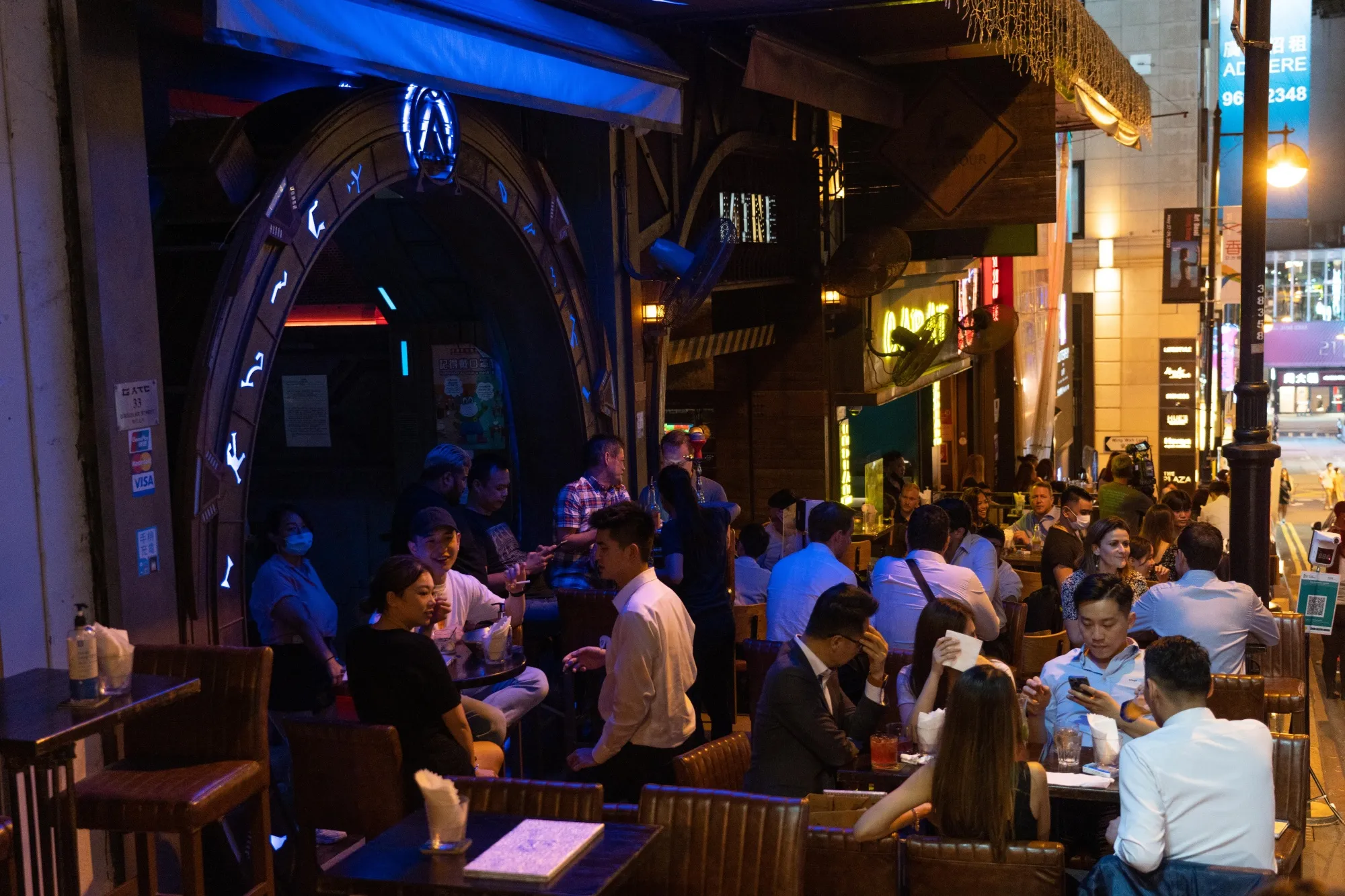 Customers at a restaurant in the Lan Kwai Fong nightlife area in Hong Kong, China, on&nbsp;May 19.