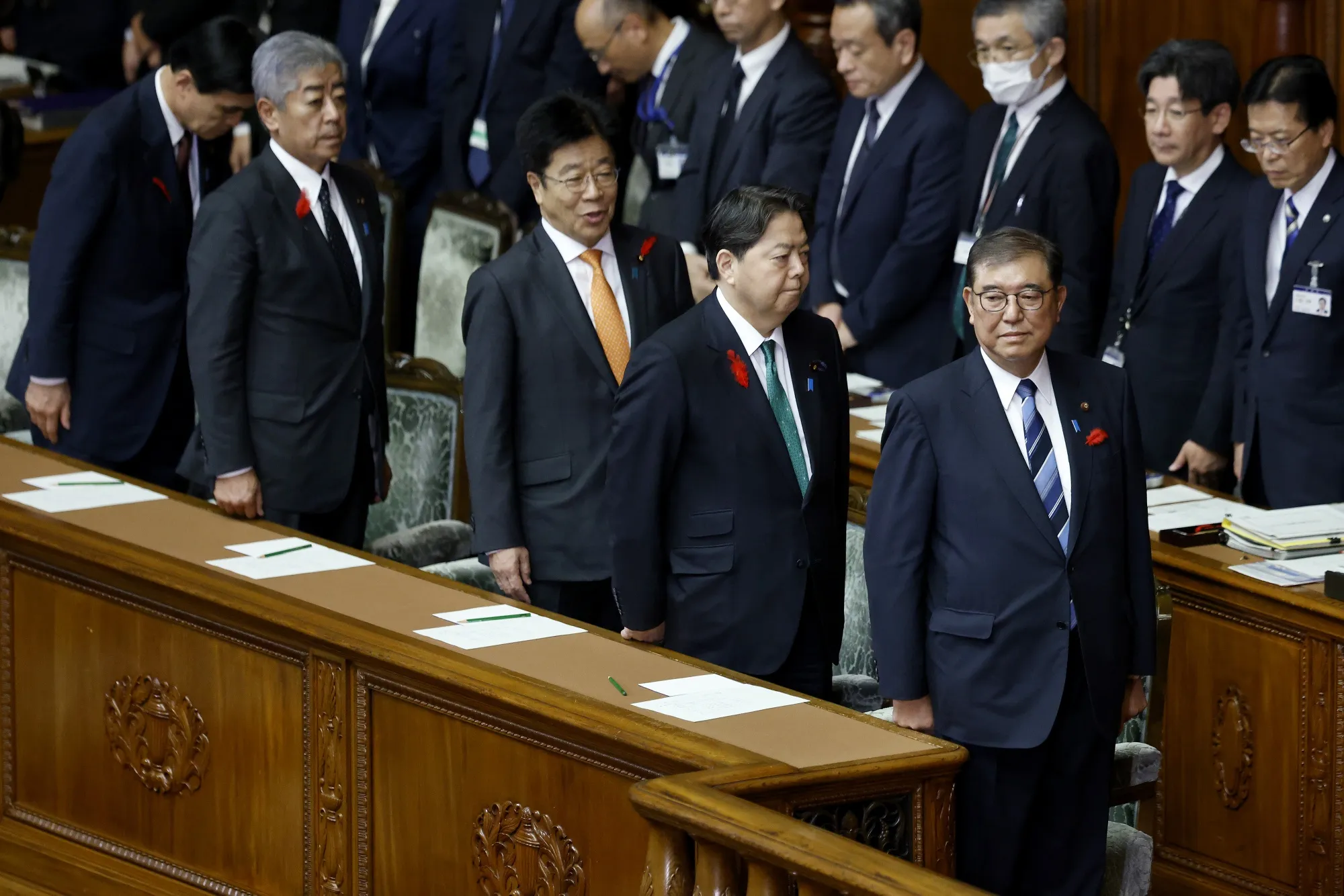 Prime Minister Shigeru Ishiba,&nbsp;right, and other cabinet members in Tokyo on Oct. 9.
