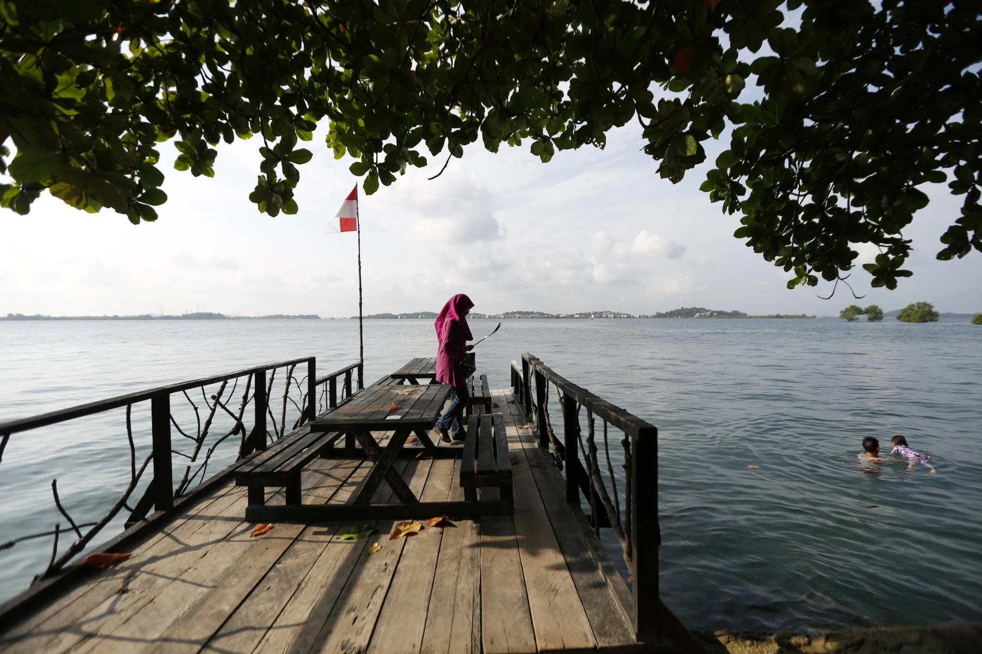 A local tourist&nbsp;on a beach in Batam Island, Indonesia.