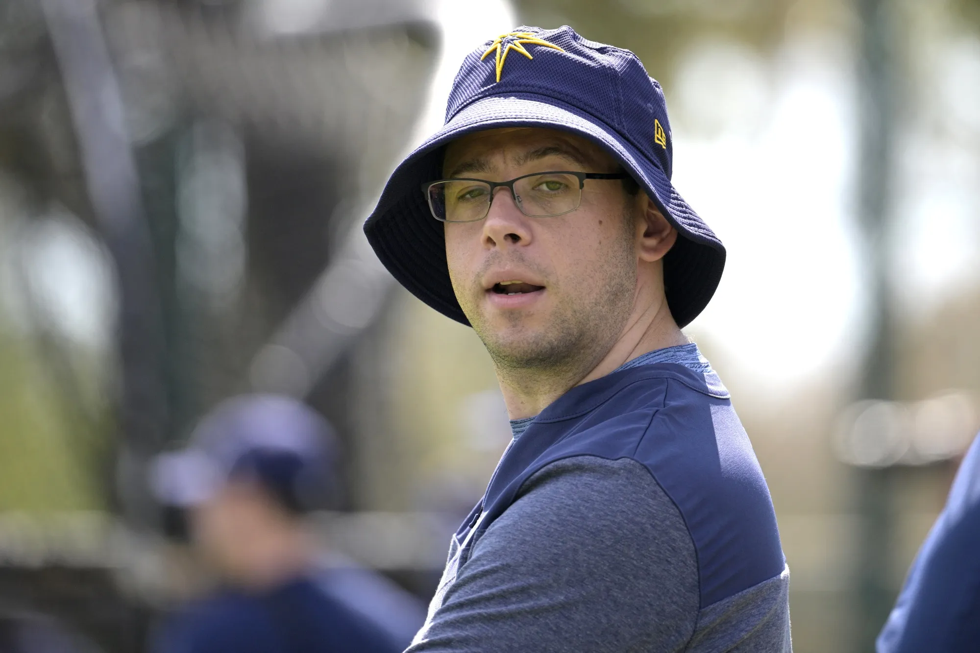 Tampa Bay Rays general manager Peter Bendix watches during practice at spring training baseball camp, Monday, Feb. 20, 2023, in Kissimmee, Fla. The Miami Marlins are hiring Tampa Bay general manager Peter Bendix to head their baseball operations department, a person with knowledge of the decision said Sunday night, Nov. 5.(AP Photo/Phelan M. Ebenhack, File)