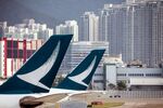 Tail fins of Cathay Pacific Airways Ltd. aircraft are seen at Hong Kong International Airport in Hong Kong, China.