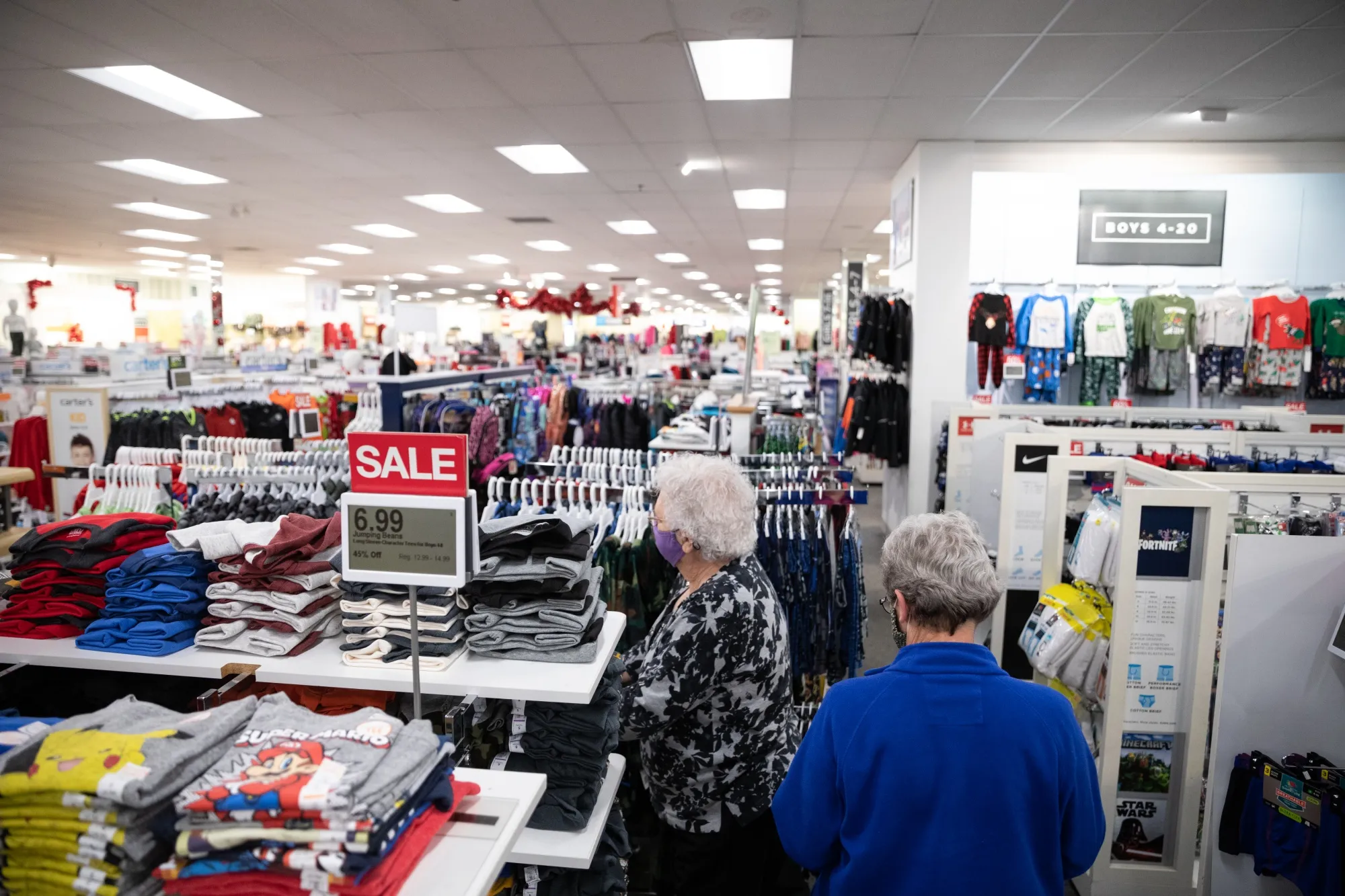 Shoppers view children clothing for sale at a Kohl's. department store in Woodstock, Georgia.
