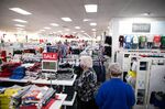 Shoppers view children clothing for sale at a Kohl's. department store in Woodstock, Georgia.