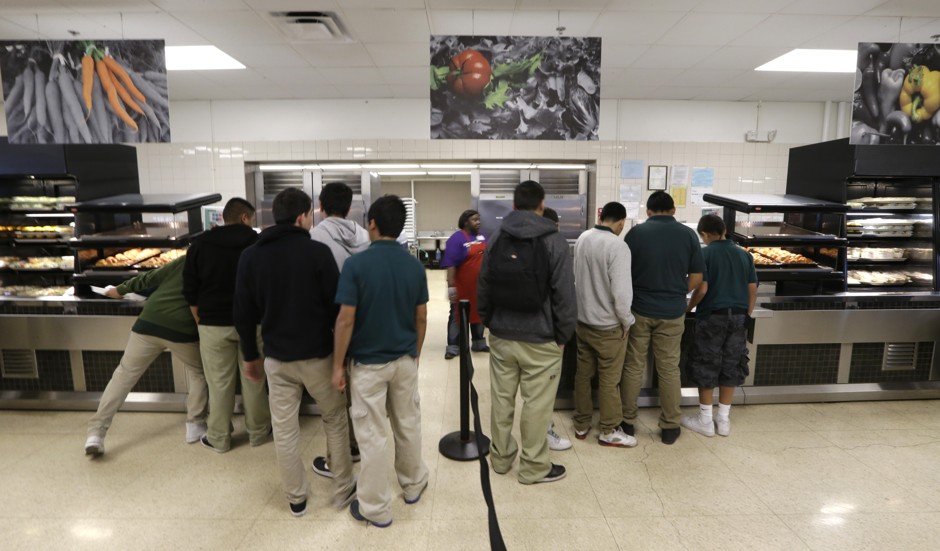 Students line up for lunch in the cafeteria at Thomas Jefferson High School in Dallas.