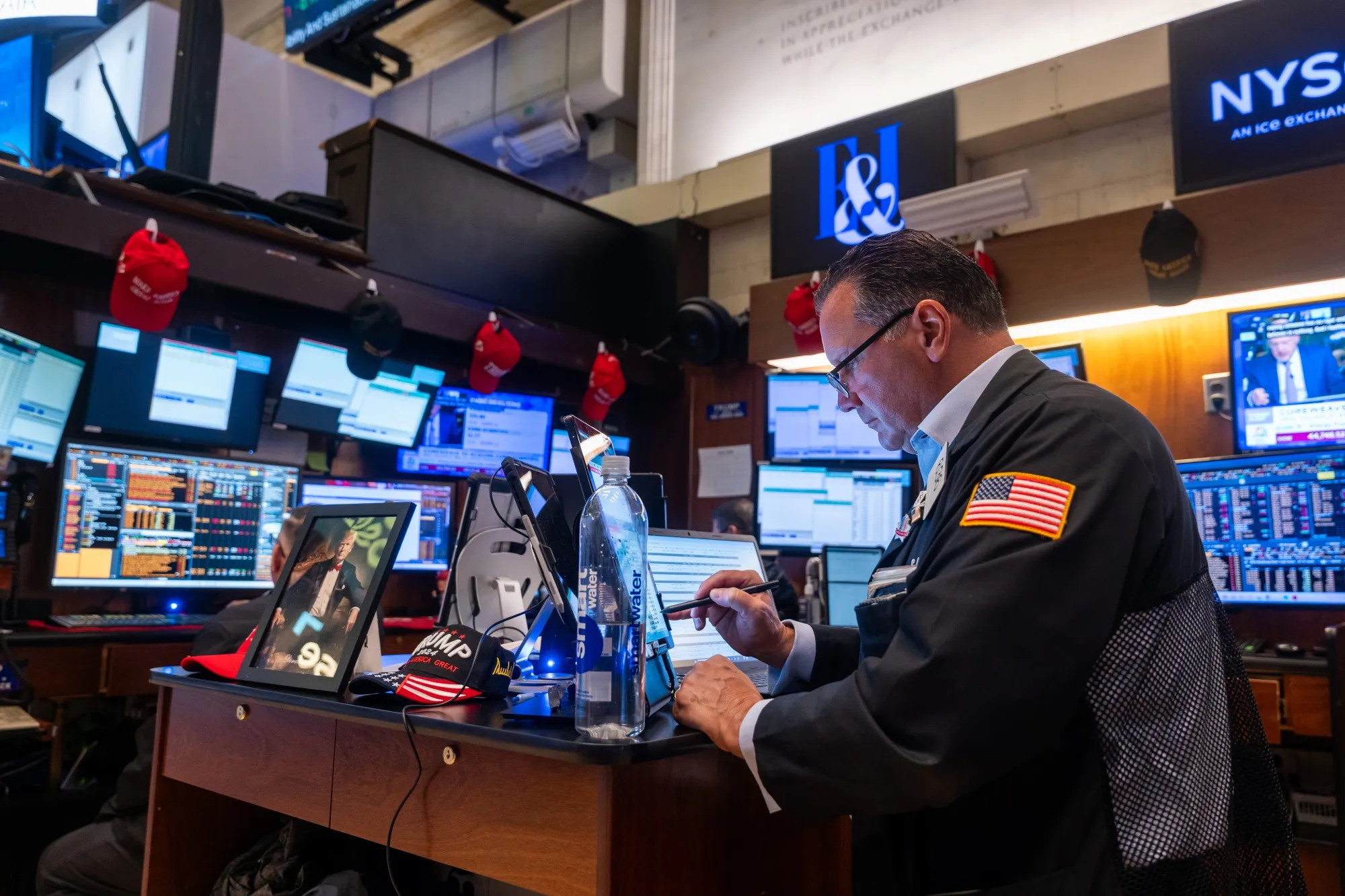 Traders work on the floor of the New York Stock Exchange.