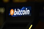 View of a Bitcoin sign on a Bitcoin ATM at a shopping mall in San Salvador (Photo by MARVIN RECINOS / AFP) (Photo by MARVIN RECINOS/AFP via Getty Images)