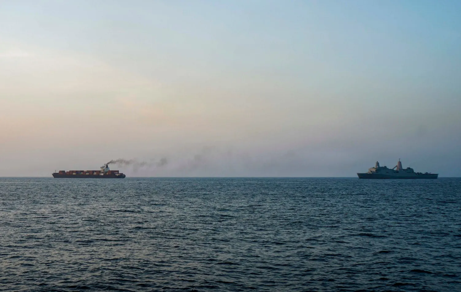 US forces patrol the Arabian Sea near a cargo ship in the Strait of Hormuz on&nbsp;April 20.