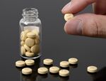 Avigan influenza tablets, produced by Fujifilm Holdings Corp., are arranged for a photograph at the company's headquarters in Tokyo, Japan.