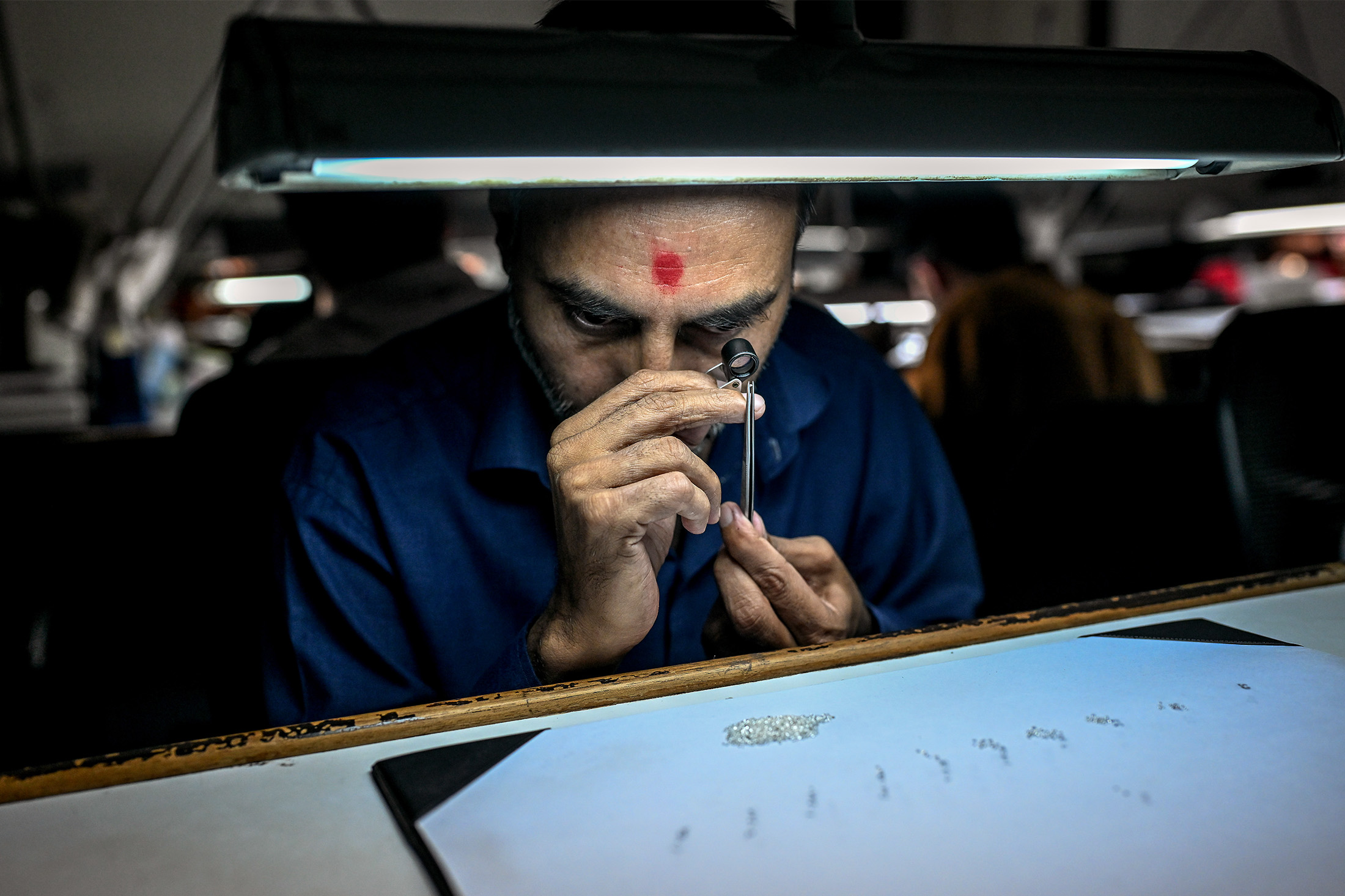People working at a diamond manufacturer office in Surat, Gujarat, India on 18 February 2026. Photo By Atul Loke / Bloomberg Photographer: Atul Loke/Bloomberg