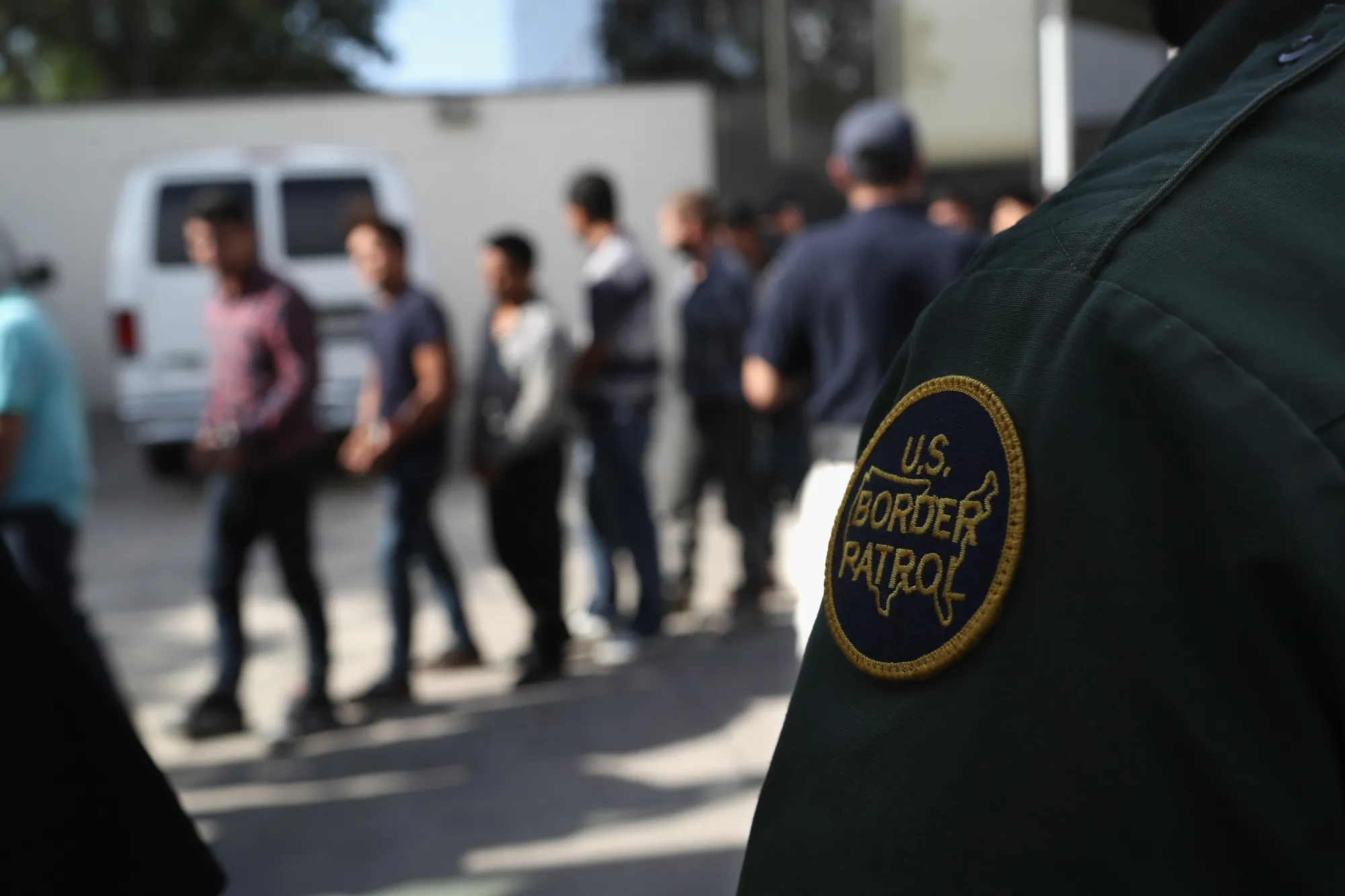 Undocumented immigrants leave a U.S. federal court in McAllen, Texas, in 2018. President Joe Biden is now trying to put a moratorium on deportations.