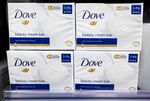 Packets of Dove soap at a supermarket.