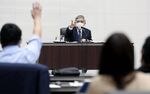 Haruhiko Kuroda, governor of the Bank of Japan (BOJ), takes a question from member of the medias during a news conference at the central bank's headquarters in Tokyo, Japan, on Friday, March 19, 2021. BOJ unveiled a set of carefully crafted policy tweaks aimed at giving itself more flexibility to keep up its long quest to revive inflation.