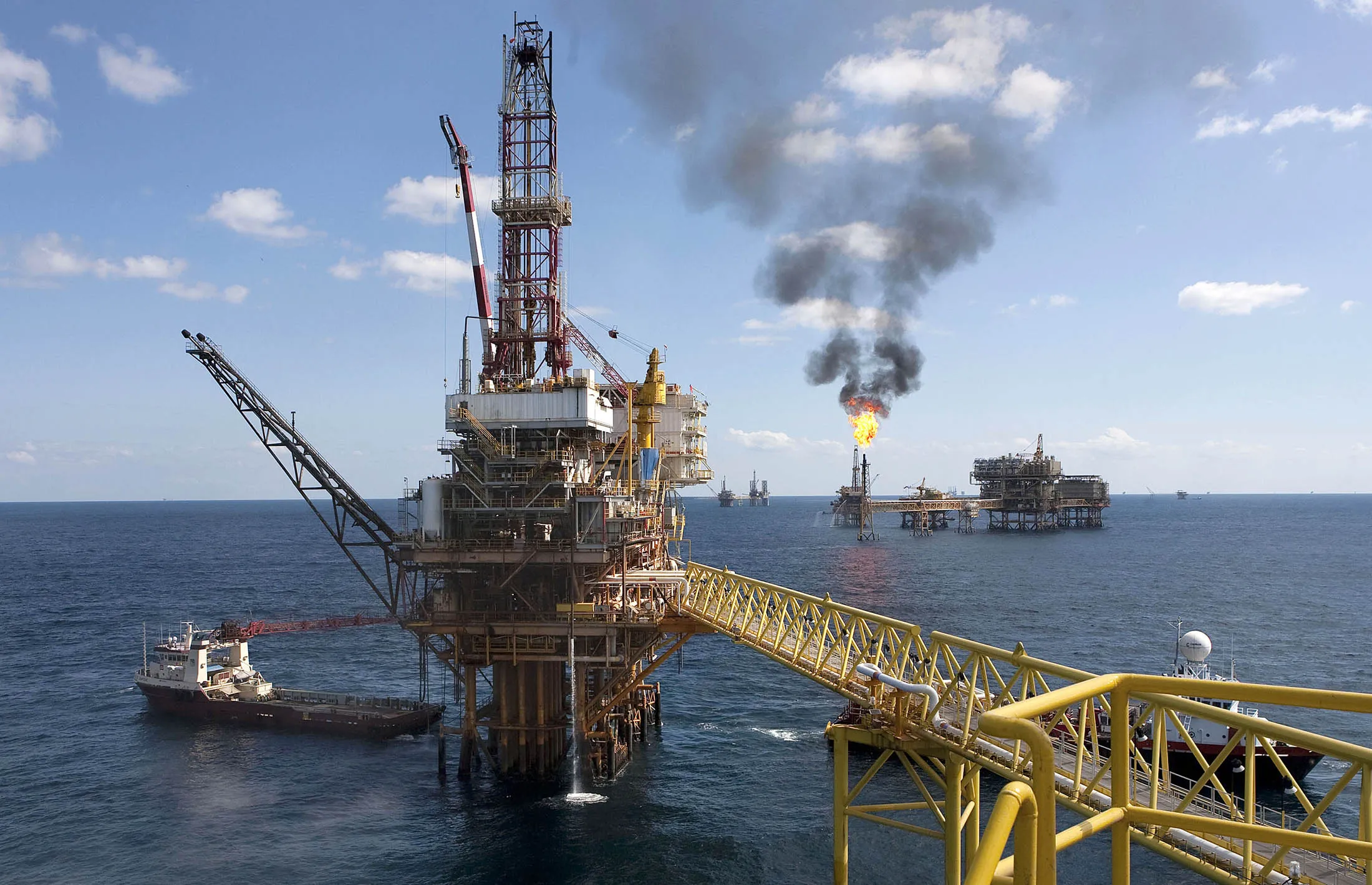 A Petroleos Mexicanos offshore platform produces oil from the Ku-Maloob-Zaap field in the Gulf of Mexico 65 miles northeast of Ciudad del Carmen, Mexico, on Thursday, Oct. 7, 2010. Ku-Maloob-Zaap, Mexico's largest oil project, will keep producing about 850,000 barrels a day 'for the next two or three years,' the company said in May. Pemex, as the state-owned company is known, is Latin America's largest oil producer.
