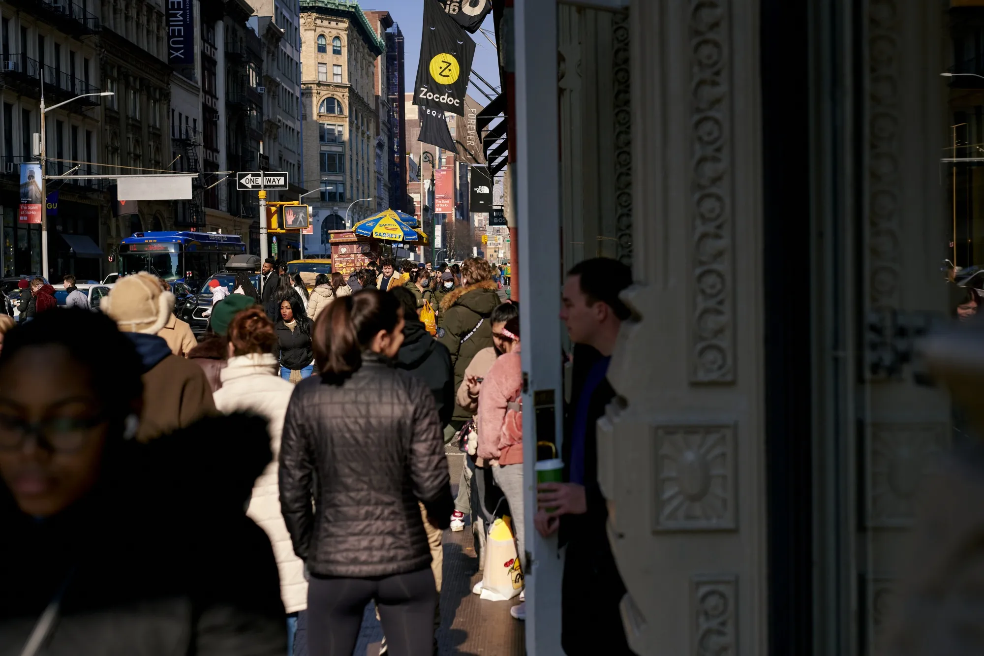 Pedestrians and shoppers in the SoHo neighborhood of New York.